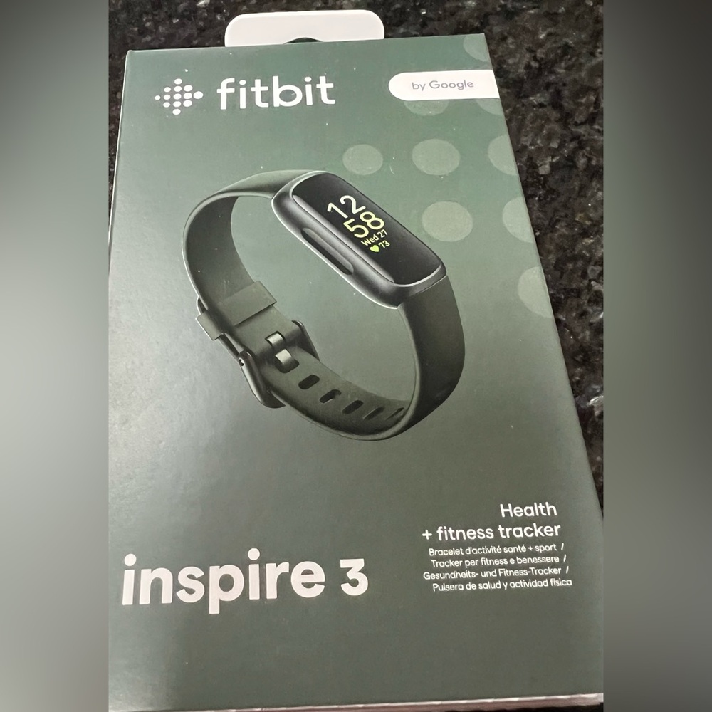 Fitbit by Google. Black band. Duplicate gift, never opened or used.